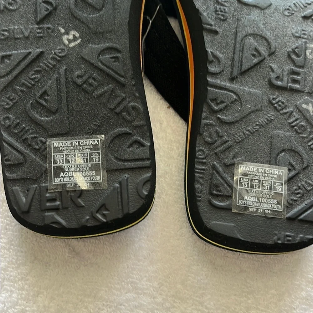 Quiksilver Black and Yellow Flip Flops